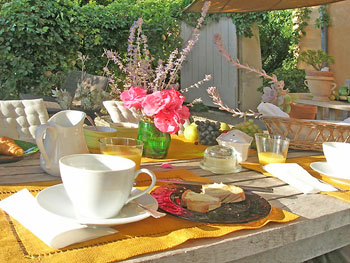 Breakfast on the terrace.   Copyright Cold Spring Press.  All rights reserved.