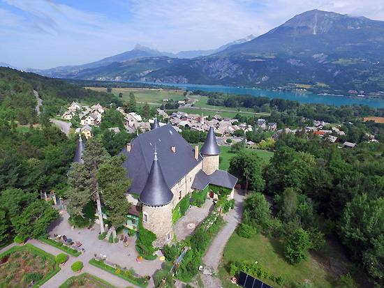 Aerial view of Château de Picomtal and the lake