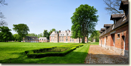 The stables and château